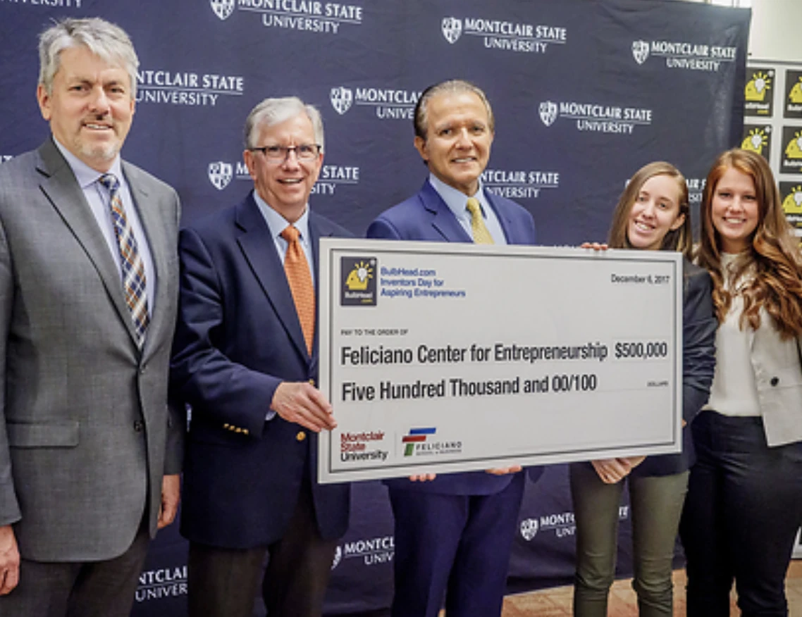 AJ Khubani at a Montclair State University check presentation supporting student entrepreneurs