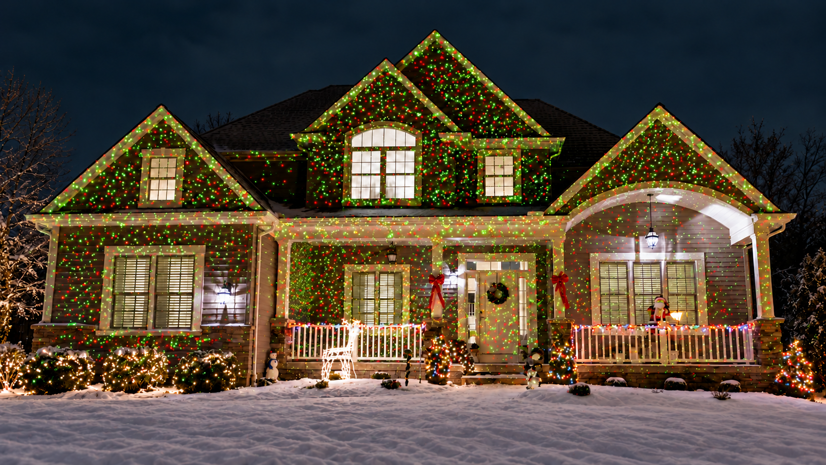 A home illuminated with Star Shower’s green and red laser lights at night
